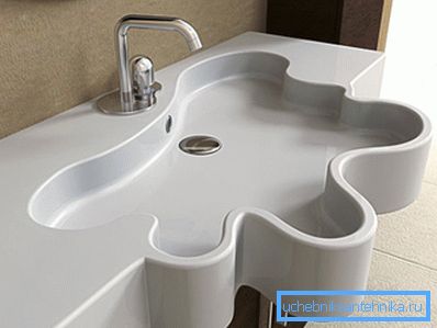 Оригиналниот дизајн на мијалник-countertop. Оригиналниот дизајн на мијалник-countertop.
